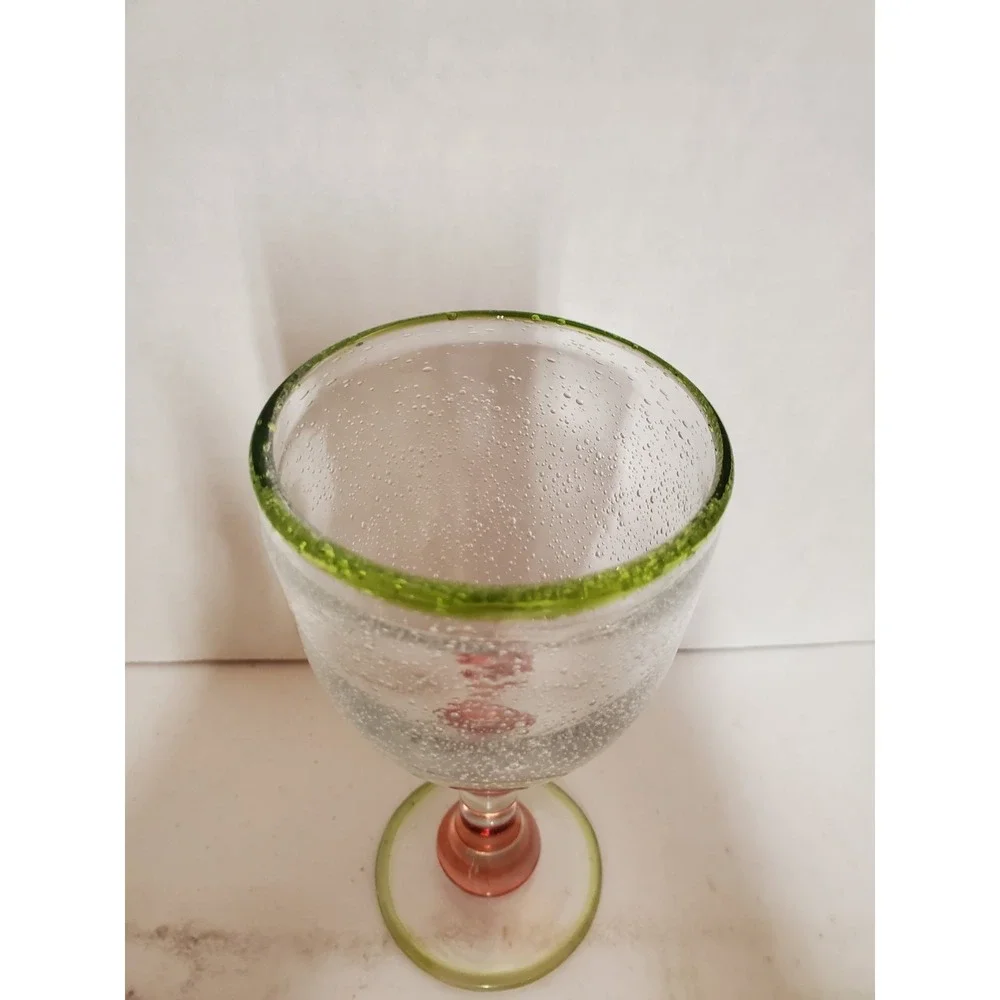 Pottery Barn wine glass featuring Bubble Effect Bowl And Pink Stem W/green Rim